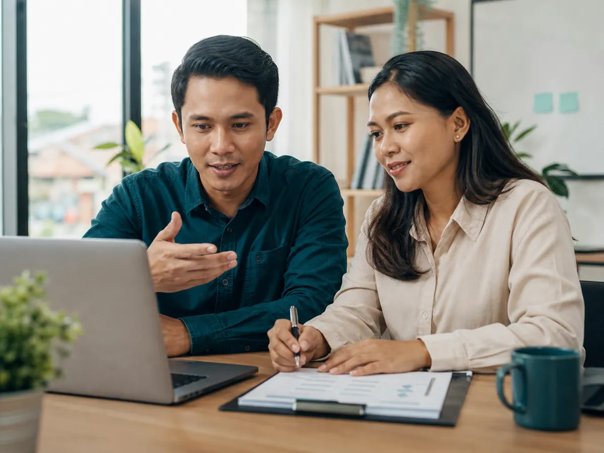 Vasco customer-success specialists reviewing an implementation plan